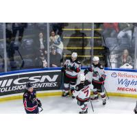 Kelowna Rockets' Andrew Cristall, Max Graham, and Jackson Gillespie on game night