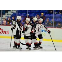 Vancouver Giants gather after a goal