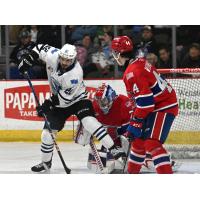 Wenatchee Wild's Zane Saab battles Spokane Chiefs' Saige Weinstein