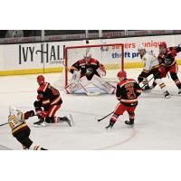 Grand Rapids Griffins goaltender Jack Campbell and defenders against the Chicago Wolves