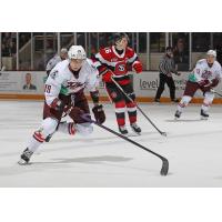 Peterborough Petes left wing Caden Taylor (left) vs. the Ottawa 67's