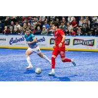 St. Louis Ambush's William Eskay and Kansas City Comets' Leonardo Acosta in action