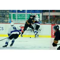 Vancouver Giants defenceman Mazden Leslie pancakes a member of the Victoria Royals