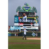 Peter Freund, CEO Of Diamond Baseball Holdings, throws out the ceremonial first pitch at Dayton Dragons-CincinnatiReds Game